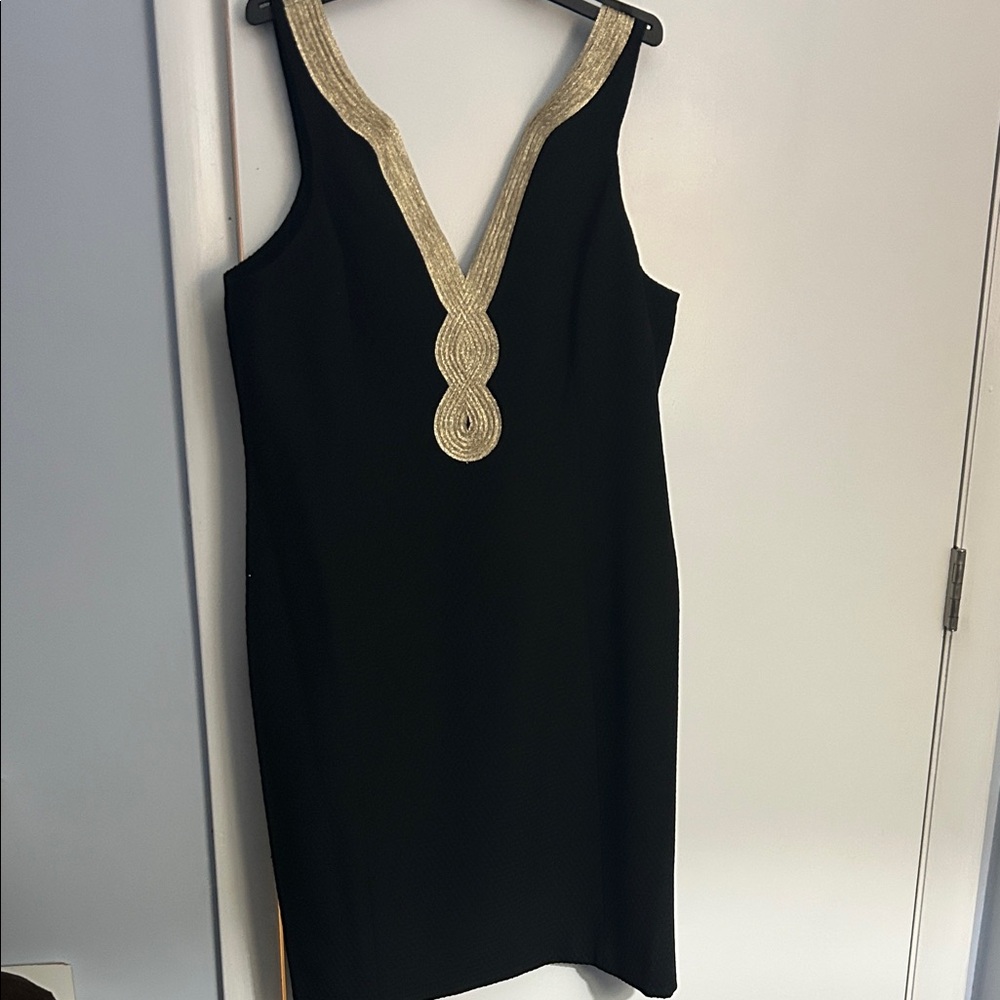 Chic Black Dress with Gold Detailing